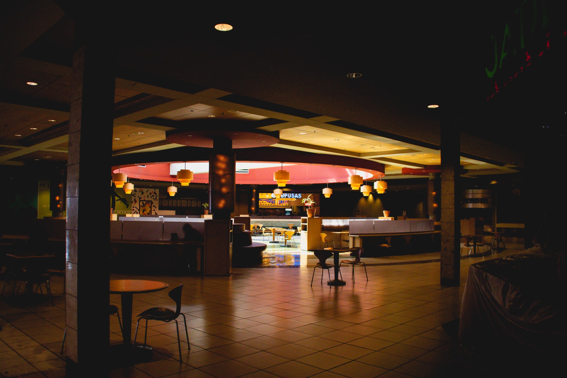 people standing near counter inside building